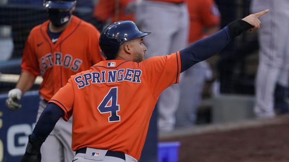 Mandatory Credit: Photo by Ashley Landis/AP/Shutterstock (10962479al)Houston Astros George Springer reacts after scoring on a single by Jose Altuve against the Tampa Bay Rays during the fifth inning in Game 6 of a baseball American League Championship Series, in San DiegoALCS Astros Rays Baseball, San Diego, United States - 16 Oct 2020.