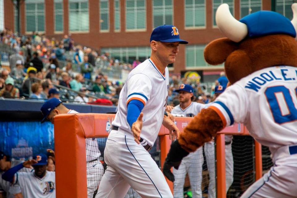 Durham Bulls’ new manager Michael Johns is introduced during the Bulls’ season opener against the Norfolk Tides, Friday March 31, 2023 at the Durham Bulls Athletic Park.