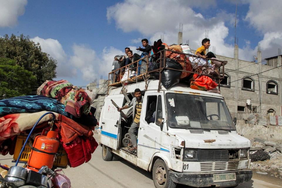 PHOTO: Displaced Palestinians travel in a vehicle as they flee Rafah, amid the ongoing conflict between Israel and Hamas, in Rafah, in the southern Gaza Strip, May 12, 2024. (Hatem Khaled/Reuters)