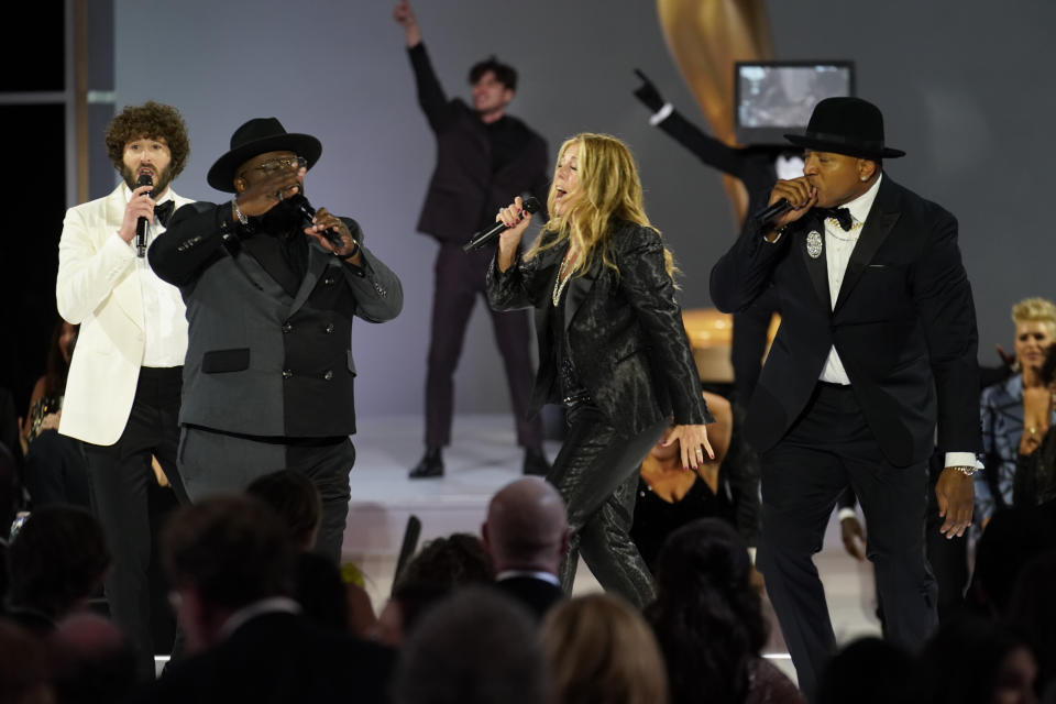 Cedric the Entertainer, Rita Wilson and LL Cool J appear at the 73rd Emmy Awards in Los Angeles. 