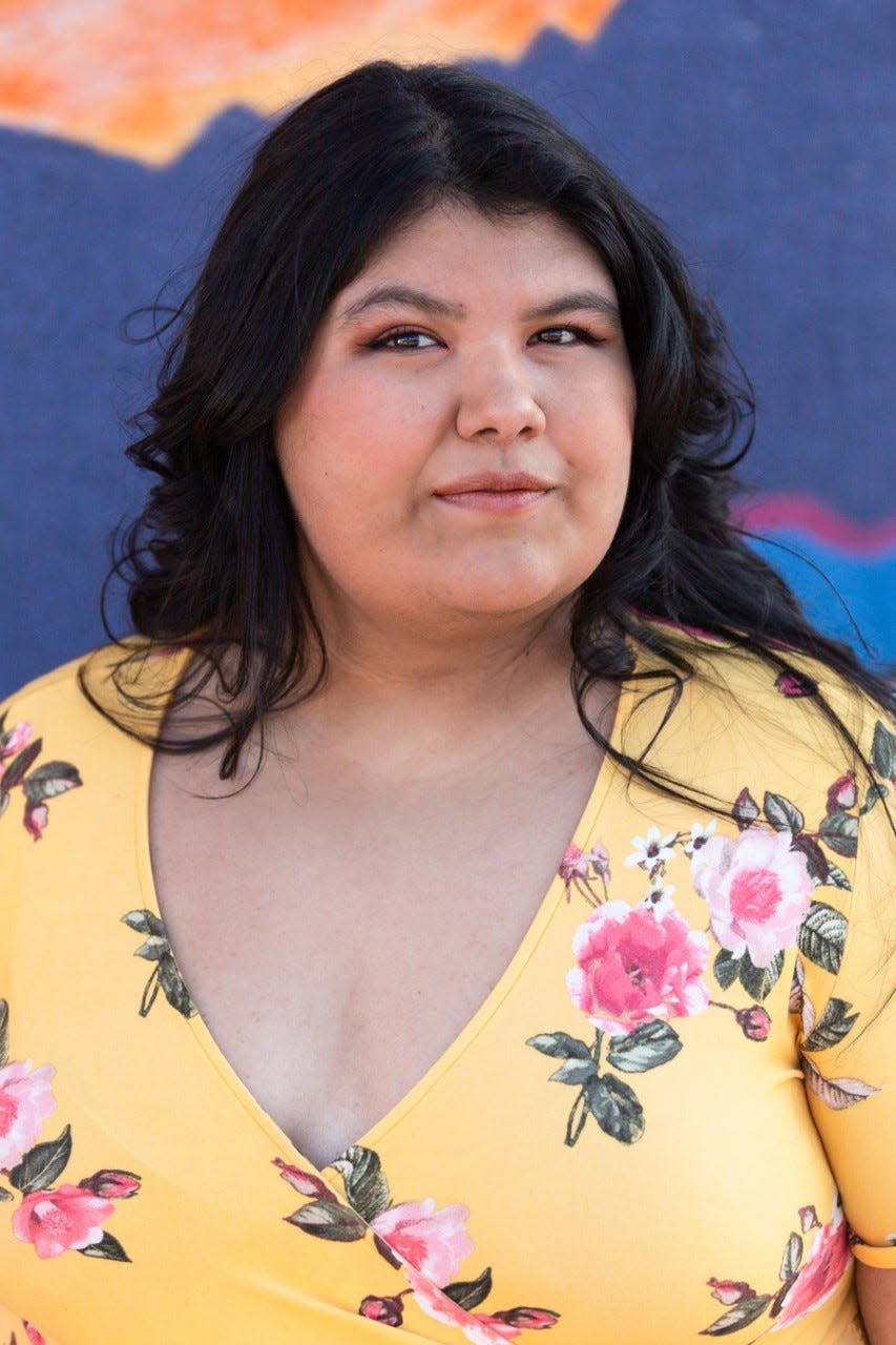 Priscilla Gandara, a music education major at New Mexico State University, performing on stage at the Atkinson Recital Hall for her senior recital April 9, 2022.