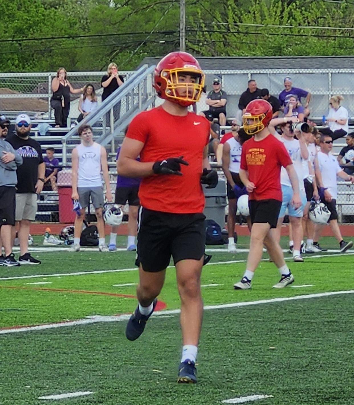Big Walnut wide receiver Brody Hatfield runs to the slot before a play during a 7-on-7 Sunday at Hartley. Hatfield is one of several returning starters for the Golden Eagles.