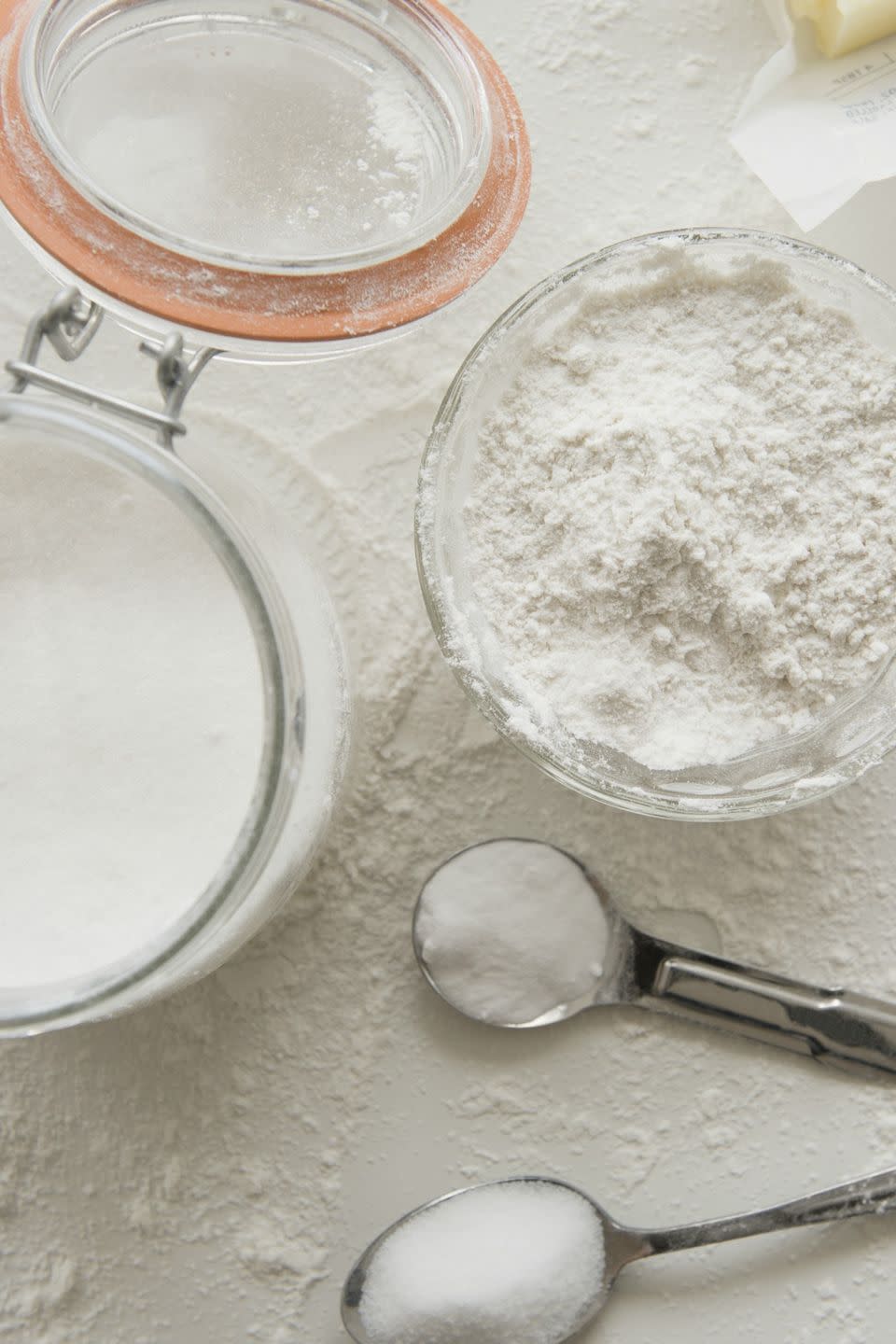 Keep canisters on a slide-out cabinet shelf.