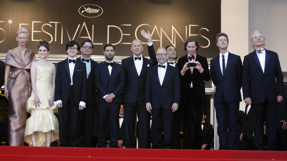 From left actors, Tilda Swinton, Kara Hayward, Jared Gilman, screenwriter Roman Coppola, actors Jason Schwartzman, Bruce Willis, Bob Balaban, composer Alexandre Desplat, director Wes Anderson, actors Edward Norton and Bill Murray arrive for the opening ceremony and screening of Moonrise Kingdom at the 65th international film festival, in Cannes, southern France, Wednesday, May 16, 2012. (AP Photo/Lionel Cironneau)