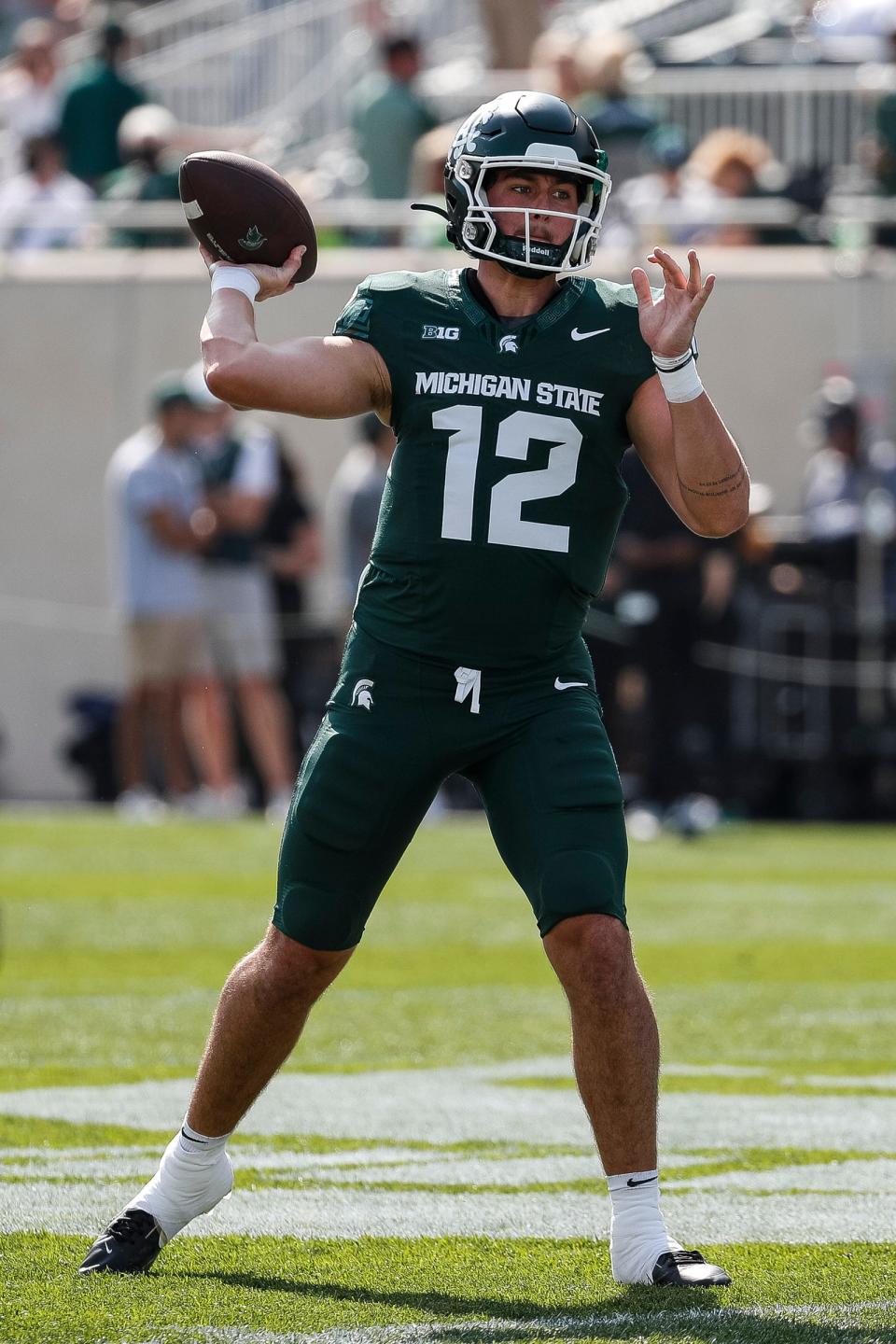 Michigan State quarterback Katin Houser (12) warms up before the Maryland game at Spartan Stadium in East Lansing on Saturday, Sept. 23, 2023.