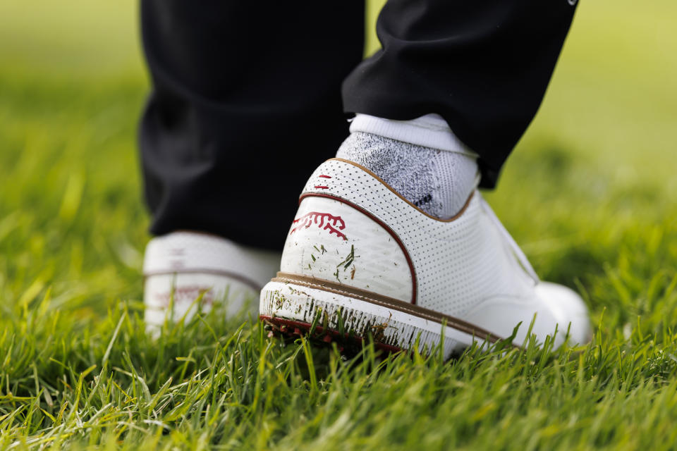 Tiger Woods' new apparel line logo is seen on his shoes during the Genesis Invitational pro-am golf event at Riviera Country Club, Wednesday, Feb. 14, 2024, in the Pacific Palisades area of Los Angeles. (AP Photo/Ryan Kang)