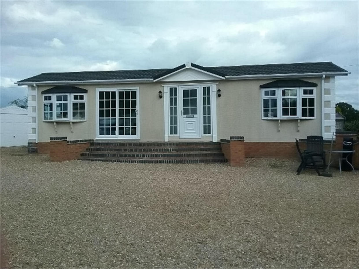 The £30k static caravan which was stolen. See SWNS story SWHOME; A woman has been left homeless after thieves load her £30k static caravan onto flat trailer and drove off with it. Police are urgently seeking information following the theft of a motor home in Willand, near Cullompton. The incident happened between 6pm on Wednesday 22 November and 6am on Thursday 23 November 2017 at The Yard on Willand Road, Cullompton. Thieves entered a locked yard and loaded the 40ft static caravan on to a flat trailer and removed it from the yard. The victim, a local woman, was not present at the time of the offence and is now without a home. Pictures of the park home are attached. The serial number is SA11.049221E. PC Marie Gorfin said: “The home would have to had to been taken by a specific low loader trailer that is capable of taking a caravan of this size and by someone that knew what they were doing. “This is a very high value and emotive crime as victim is now homeless and clearly distraught. 