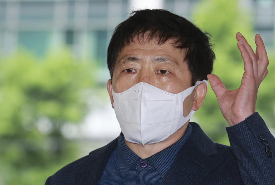 Park Sang-hak, speaks to the media upon his arrival at the Seoul Metropolitan Police Agency in Seoul, South Korea, Monday, May 10, 2021. South Korean police in Monday summoned the activist who said he flew hundreds of thousands of anti-Pyongyang propaganda leaflets toward North Korea in defiance of a new controversial law that criminalizes such activities. (Hong Hye-in/Yonhap via AP)