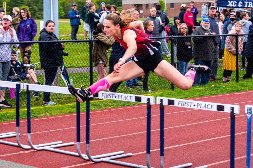Old Rochester's Jennifer Williams took first in the 100 hurdles at the SCC Championship.