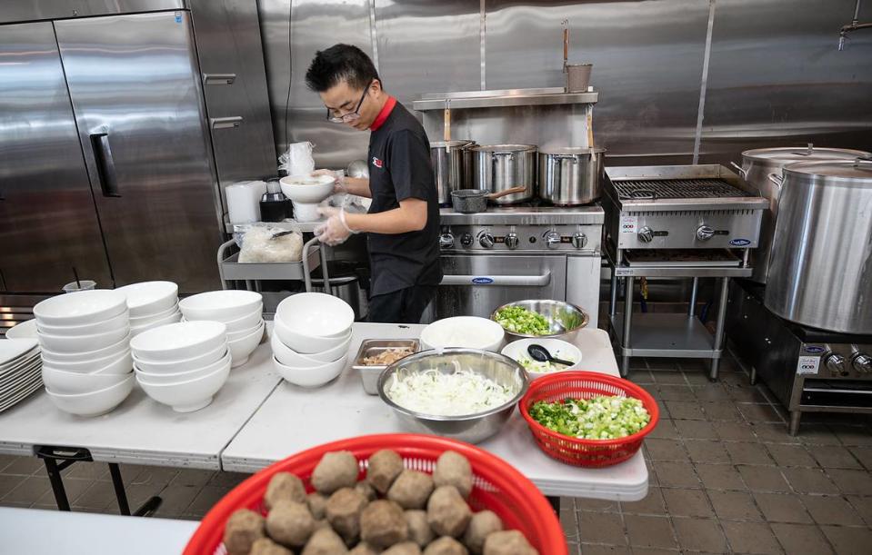 Owner Thuan Do prepares pho at The Pho restaurant on Oakdale Road in Modesto, Calif., on Wednesday, June 9, 2021. Andy Alfaro/aalfaro@modbee.com