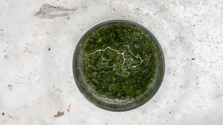 Oil and parsley mixture in bowl