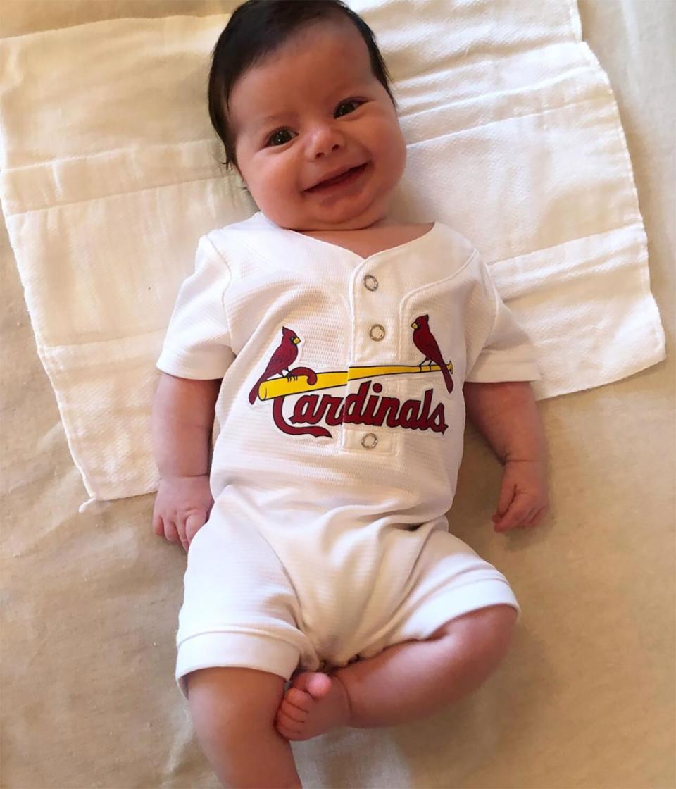 He's already a Cardinals fan! Ben celebrated Opening Day with a onesie jersey gifted from Cardinals pitcher Michael Wacha. "Smile if you're excited!" proud dad Andy <a href="https://www.instagram.com/p/Bv4V7D_lyBD/" rel="nofollow noopener" target="_blank" data-ylk="slk:captioned;elm:context_link;itc:0;sec:content-canvas" class="link ">captioned</a> the photo.