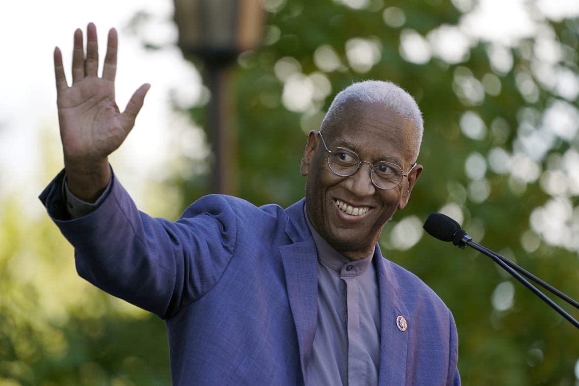 U.S. Rep. Don McEachin D-4th. waves during a rally for Democratic gubernatorial candidate, former Virginia Gov. Terry McAuliffe in Richmond, Va., Saturday, Oct. 23, 2021. McEachin died Monday, Nov. 28, 2022, after a battle with colorectal cancer, his office said. He was 61. (AP Photo/Steve Helber, File)