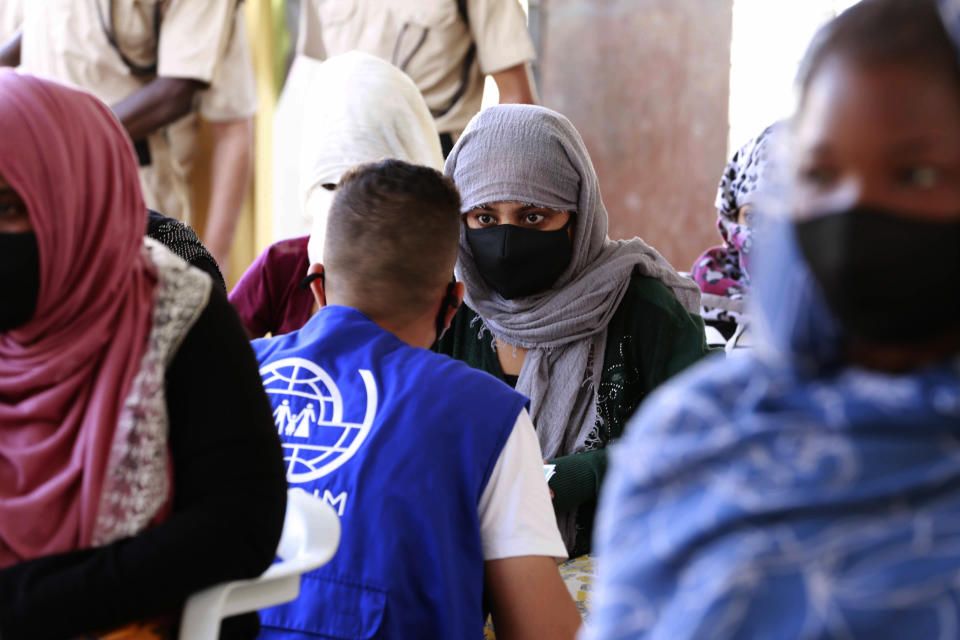 A vaccination campaign against the coronavirus is underway at a Tripoli shelter for migrants, organized jointly by the Libyan center for disease control and the International Organization for Migration. in Tripoli, Libya, Wednesday Oct. 6, 2021. (AP Photo/Yousef Murad)