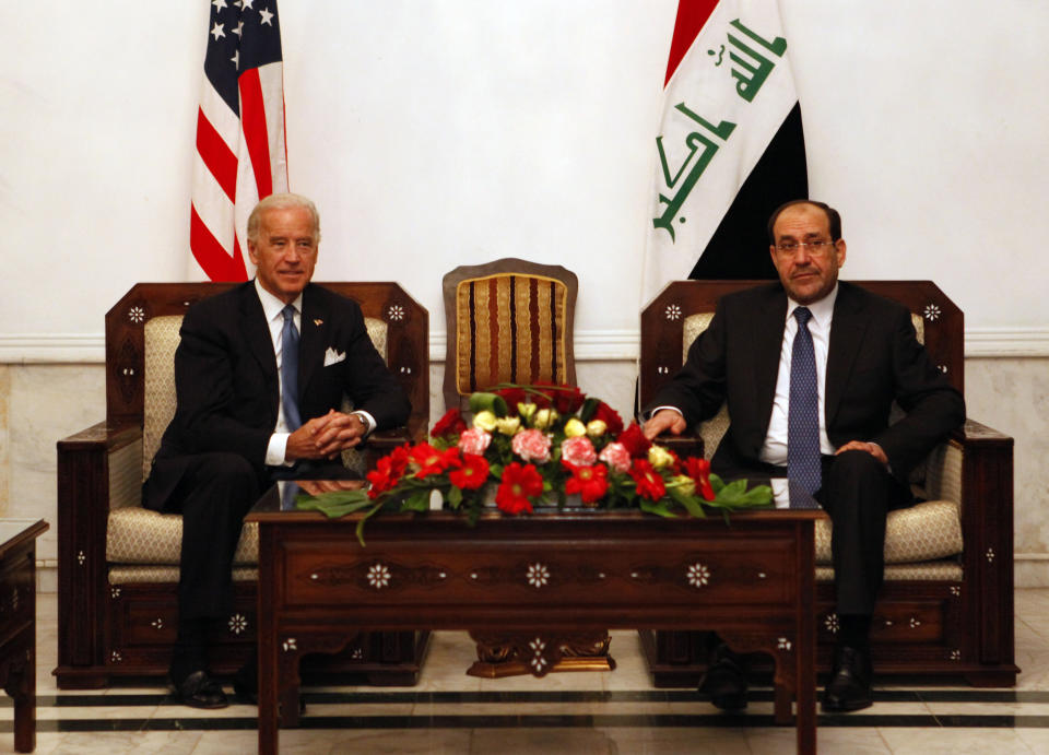 FILE - In this Jan. 23, 2010, file photo, U.S. Vice President Joe Biden, left, meets with Iraqi Prime Minister Nouri al-Maliki in Baghdad, Iraq. A burst of strength by al-Qaida that is chipping away at the remains of Mideast stability now confronts President Barack Obama, testing his hands-off approach to conflicts in Iraq and Syria at the same time he pushes to keep thousands of U.S. forces in Afghanistan. The U.S. withdrawal at the end of 2011 was followed by a spike in sectarian violence and most recently, the alarming takeover of two cities by an al-Qaida affiliate known as the Islamic State of Iraq and the Levant. (AP Photo/Hadi Mizban, Pool)