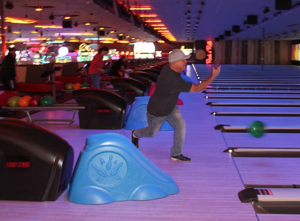 Chad Garcia, of Newbury Park, bowls Thursday at the Lucky Strike bowling alley in Moorpark, located in the former Dick's Sporting Goods store.