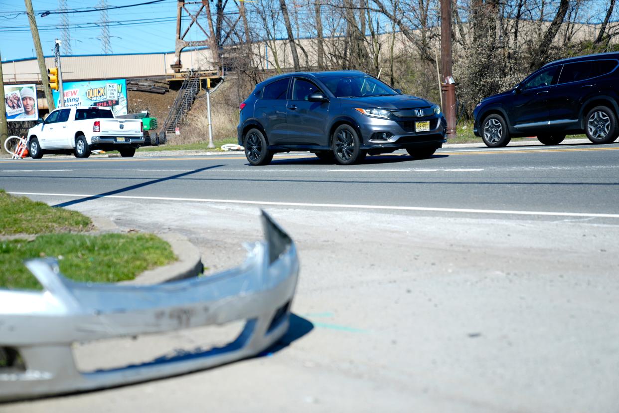 Vehicles are shown on Newark-Jersey City Turnpike, past a bumper left on the side of the road, Monday March 25, 2024, in Kearny