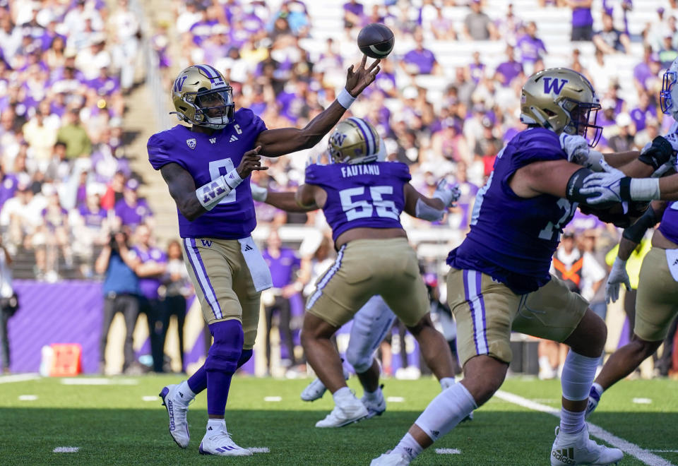 Washington quarterback Michael Penix Jr. (9) throws during the second half of the team's NCAA college football game against Boise State, Saturday, Sept. 2, 2023, in Seattle.(AP Photo/Lindsey Wasson)