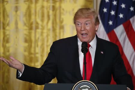 U.S. President Donald Trump holds a joint news conference with Norwegian Prime Minister Erna Solberg in the East Room of the White House in Washington, U.S., January 10, 2018. REUTERS/Jonathan Ernst