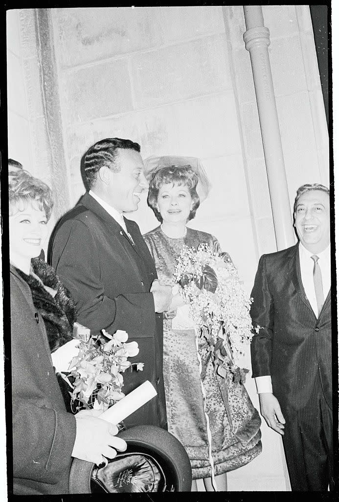 <p>After a 20-year marriage to costar Desi Arnaz, Lucille Ball married night club comedian Gary Morton in 1961. For the joyous occasion, that was met with 1,000 fans gathering outside of the church, Lucille wore a silk brocade coat and veiled fascinator. </p>