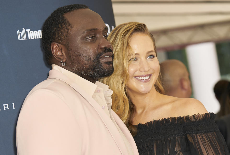 US actor Brian Tyree Henry and US actress Jennifer Lawrence arrive for the premiere of Causeway during the Toronto International Film Festival in Toronto, Canada, on September 10, 2022. (Photo by Geoff Robins / AFP) (Photo by GEOFF ROBINS/AFP via Getty Images)