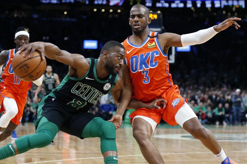 Oklahoma City Thunder's Chris Paul (3) pressures Boston Celtics' Kemba Walker (8) in the back court during the second half of an NBA basketball game, Sunday, March, 8, 2020, in Boston. (AP Photo/Michael Dwyer)