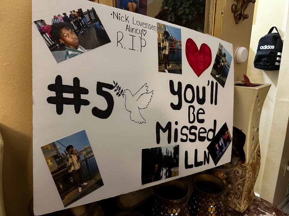 A photo collage of 17-year-old Nick Alincy created for a vigil sits up in the home of his family. Nick went missing in rough surf off the shore of Jensen Beach Nov. 6, 2023. His body was found at Bathtub Beach Nov. 7, 2023.