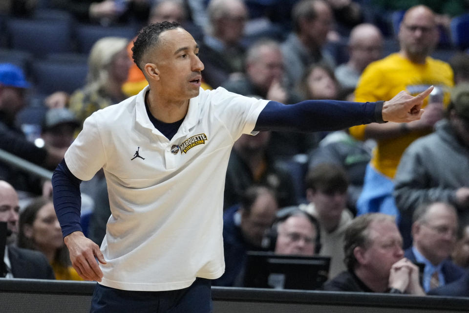 Marquette head coach Shaka Smart directs his team as they played against Vermont in the second half of a first-round college basketball game in the men's NCAA Tournament in Columbus, Ohio, Friday, March 17, 2023. Marquette defeated Vermont 78-61. (AP Photo/Michael Conroy)