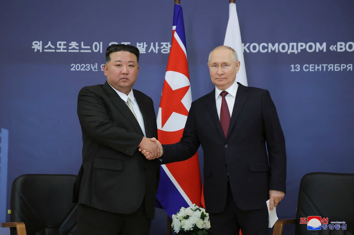 Kim Jong-un shaking hands with Vladimir Putin during their meeting.  (KCNA VIA KNS/AFP via Getty Image)