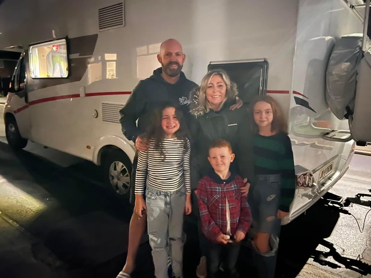 The family with their campervan, November 2022.  (Carl Jackson / SWNS)