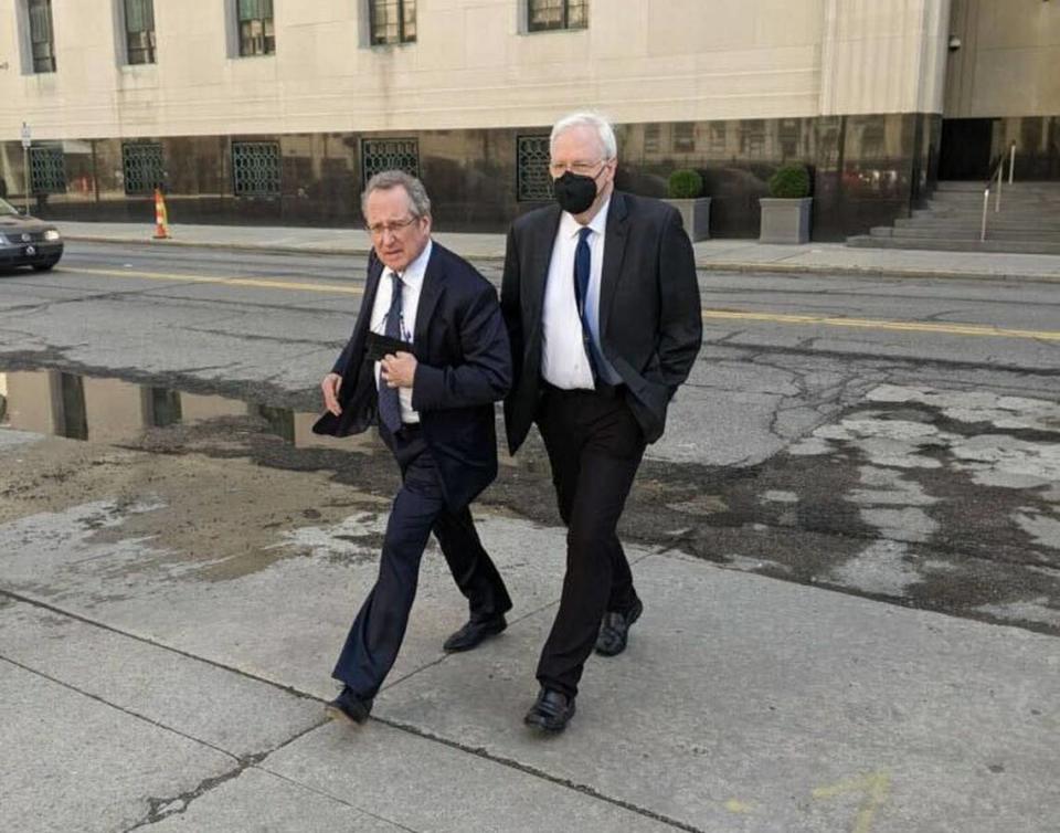 Stephen Shipps and his attorney, John Shea, leave the federal courthouse in Detroit after Shipps was sentenced to five years in prison for trafficking an underage student for sex.