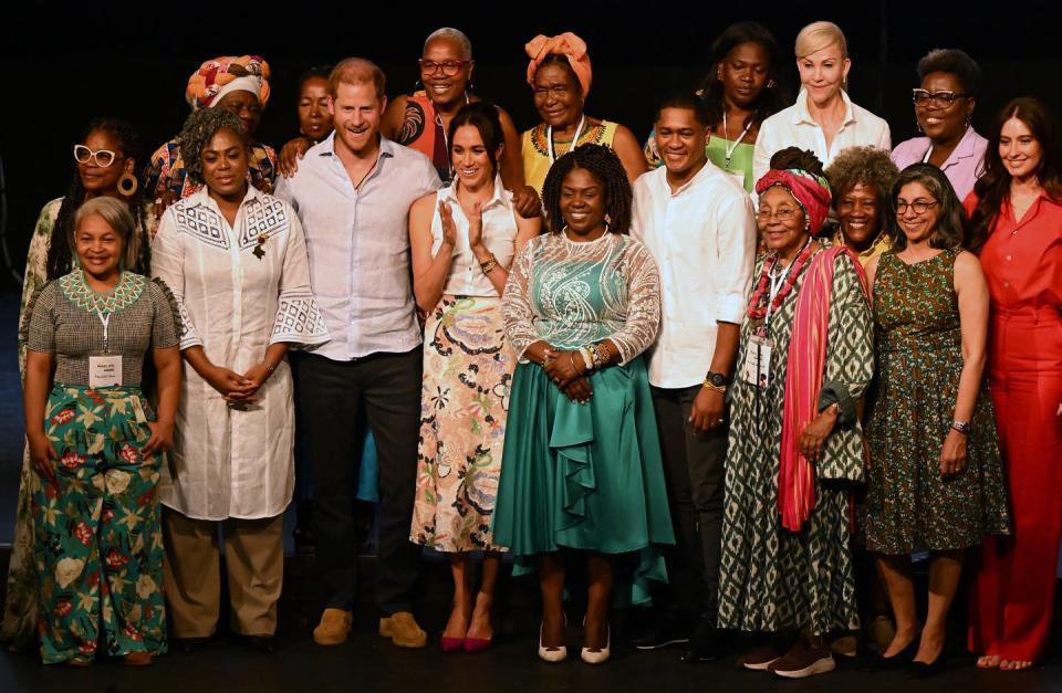 britains prince harry 3rd l, duke of sussex, and his wife meghan markle 4th l pose for a picture with colombias vice president francia marquez c and her partner yerney pinillo c r and colombias former education minister aurora vergara 2nd l alongside other participants at the end of the afro women and power forum, at the municipal theatre in cali, colombia, on august 18, 2024 prince harry and his wife, american actress meghan markle, are visiting colombia at the invitation of colombias vice president francia marquez, with whom they have attended various meetings with women and young people to reject discrimination and cyberbullying photo by raul arboleda afp photo by raul arboledaafp via getty images