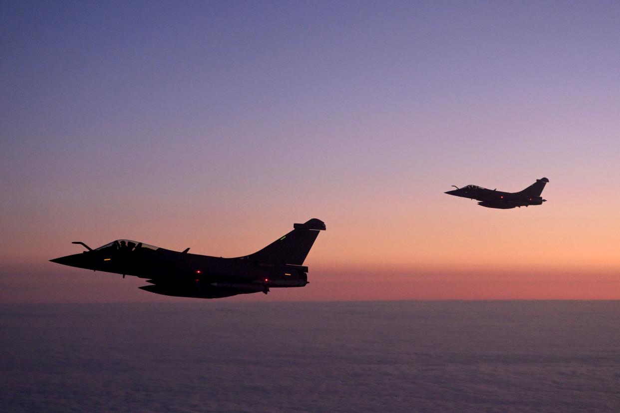 TOPSHOT - Rafale jet fighters of the French Air Force patrol the airspace over Poland on March 4, 2022, as part of Nato's surveillance system conducted in collaboration with the military aviation of other countries of the Alliance. (Photo by Nicolas TUCAT / AFP) (Photo by NICOLAS TUCAT/AFP via Getty Images)