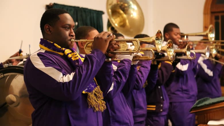 New Orleans high school band marches into Sandwich as part of Underground Railroad tour