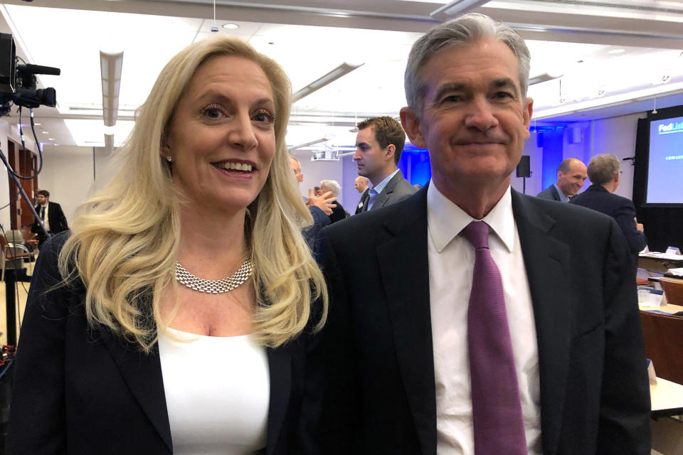 Federal Reserve Chairman Jerome Powell poses for photos with Fed Governor Lael Brainard (L) at the Federal Reserve Bank of Chicago, in Chicago, Illinois, U.S., June 4, 2019.    REUTERS/Ann Saphir