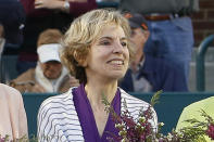 FILE - In this April 7, 2012, file photo, Julie Heldman, a member of the original nine women who helped start the women's professional tennis tour, is honored at the Family Circle Cup tennis tournament in Charleston, S.C. It’s the 50th anniversary of Billie Jean King and eight other women breaking away from the tennis establishment in 1970 and signing a $1 contract to form the Virginia Slims circuit. That led to the WTA Tour, which offers millions in prize money. (AP Photo/Mic Smith, File)