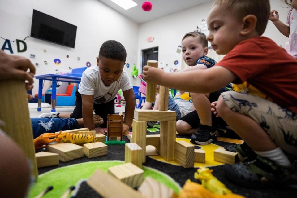 Children play with blocks in a classroom June 9, 2022, at Fellowship of the Parks. The day care started as part of SigmaPro Engineering and Manufacturing during the pandemic.