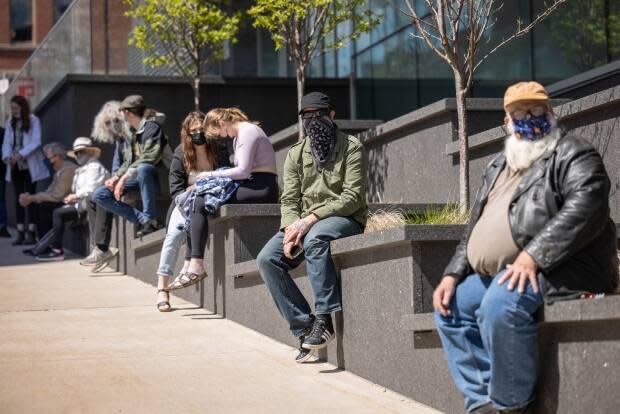 Quiet Streets in downtown Halifax, People lined up for Covid testing near the Halifax Convention Centre.