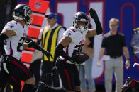 Atlanta Falcons cornerback Isaiah Oliver (26) reacts after recovering a fumble by New York Giants tight end Evan Engram during the first half of an NFL football game, Sunday, Sept. 26, 2021, in East Rutherford, N.J. (AP Photo/Seth Wenig)