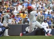 Jun 17, 2018; Milwaukee, WI, USA; Philadelphia Phillies third baseman Maikel Franco (7) hits a single to drive in 2 runs in the seventh inning against the Milwaukee Brewers at Miller Park. Mandatory Credit: Benny Sieu-USA TODAY Sports