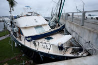 <p>A boat is crushed into a causeway in Fort Myers, Florida, on Sept. 29.</p>