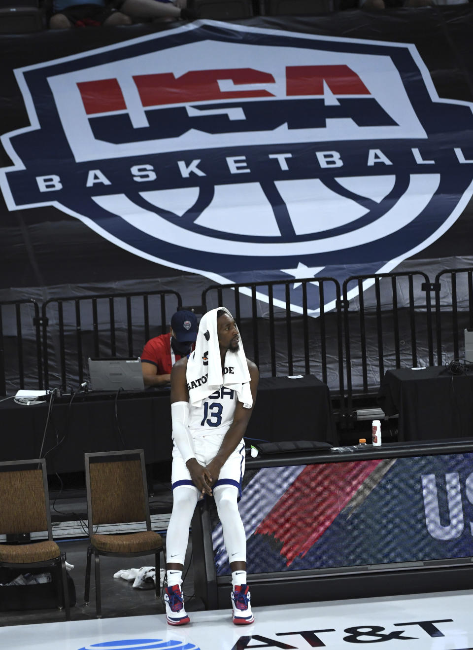 United States' Bam Adebayo (13) looks on from the sideline during an exhibition basketball game against Nigeria, Saturday, July 10, 2021, in Las Vegas. (AP Photo/David Becker)