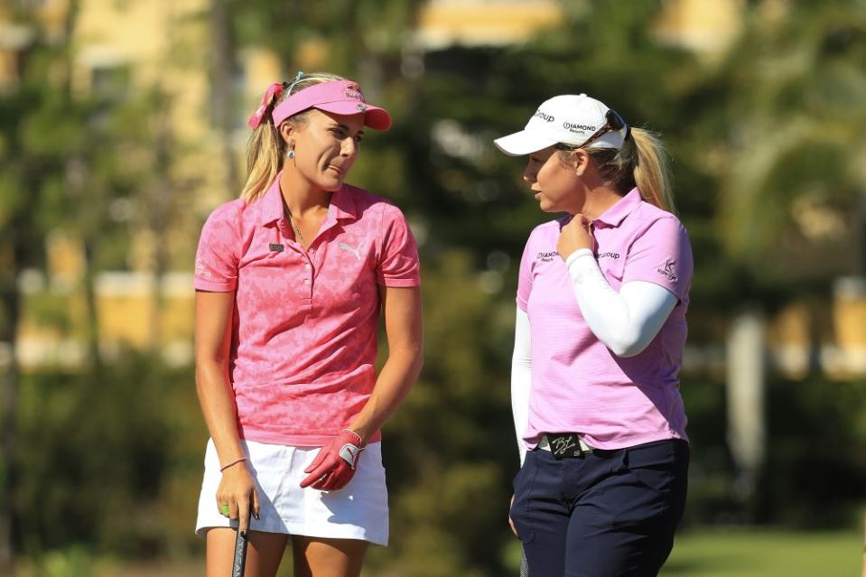 NAPLES, FL - NOVEMBER 17: Lexi Thompson talks with Brittany Lincicome on the first hole during the third round of the LPGA CME Group Tour Championship at Tiburon Golf Club on November 17, 2018 in Naples, Florida. (Photo by Mike Ehrmann/Getty Images)