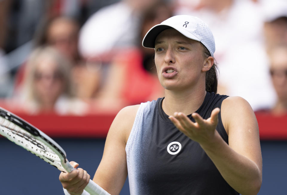 Iga Swiatek of Poland, reacts during her game against Jessica Pegula of the United States, during the semifinals of the National Bank Open women’s tennis tournament Saturday, Aug. 12, 2023, in Montreal. (Christinne Muschi/The Canadian Press via AP)