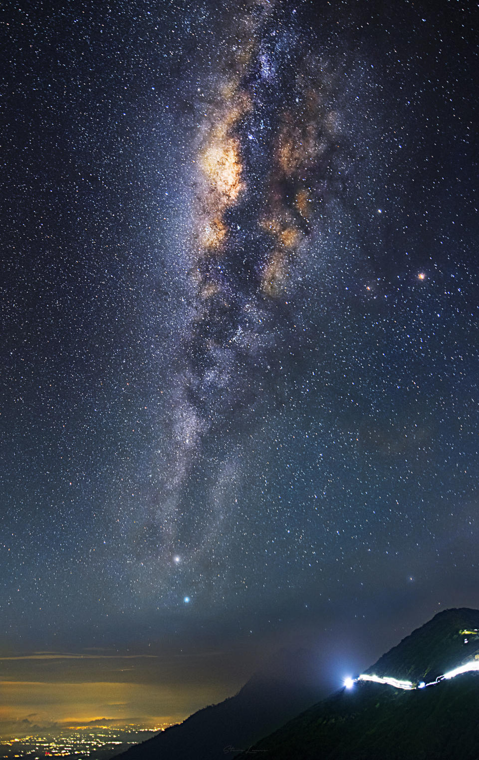 The Milky Way shines down on Mount Fuji