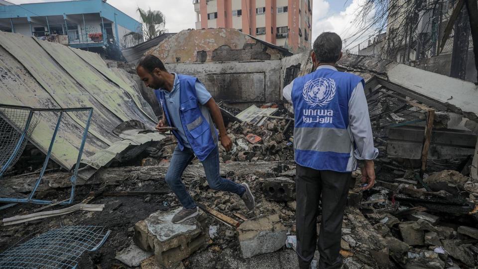 PHOTO: UNRWA employees inspect a destroyed United Nations school following an air strike in Al Nuseirat refugee camp, central Gaza Strip, May 14, 2024.  (Mohammed Saber//EPA-EFE/Shutterstock)