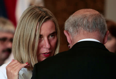 European Union High Representative for Foreign Affairs and Security Policy Federica Mogherini speaks with Portuguese Foreign Minister Augusto Santos Silva after a meeting of the International Contact Group (IGC) to discuss their support for a political solution to Venezuela's political crisis, in San Jose, Costa Rica May 7, 2019. REUTERS/Juan Carlos Ulate