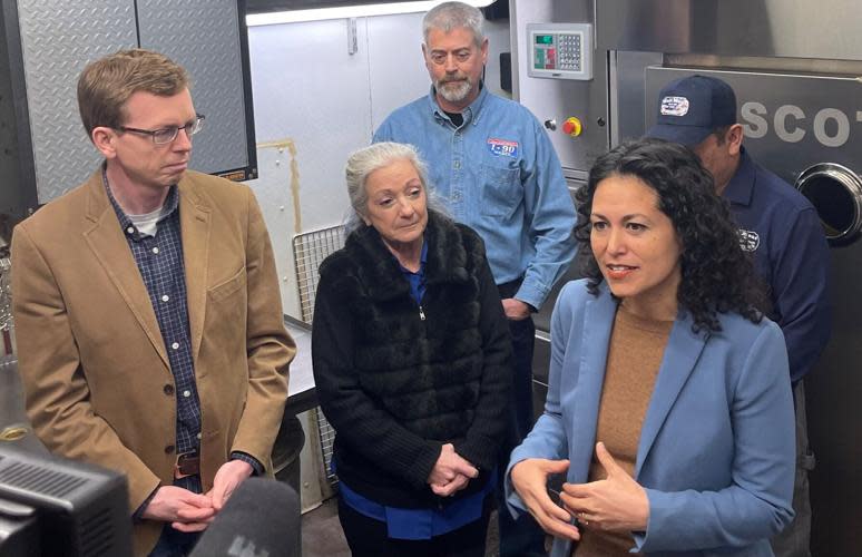 USDA Under Secretary for Rural Development Xochitl Torres Small, right, answers questions from the media during a tour of Wall Meat Processing in Wall on Friday.
