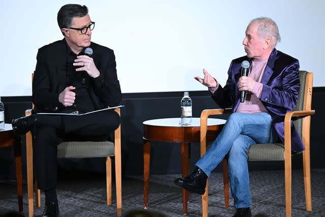 <p>Stephen Lovekin/Shutterstock</p> Paul Simon speaks to Stephen Colbert in New York City