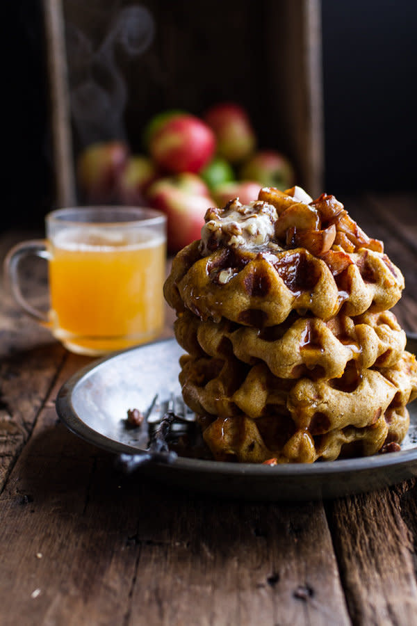 <strong>Get the <a href="http://www.halfbakedharvest.com/overnight-cider-pumpkin-waffles-wtoasted-pecan-butter-cider-syrup-spiced-apples/" target="_blank">Overnight Cider Pumpkin Waffles with Toasted Pecan Butter, Cider Syrup and Spiced Apples recipe</a> from Half Baked Harvest</strong>